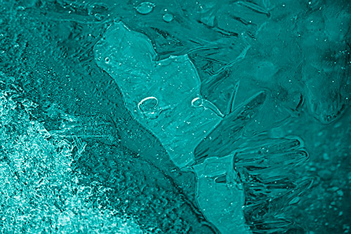 Frozen Bubble Eyed Ice Face Figure Along River Shoreline (Cyan Shade)