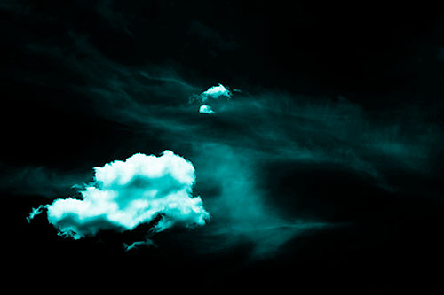 Isolated Creature Head Cloud Appears Within Darkness (Cyan Shade Photo)