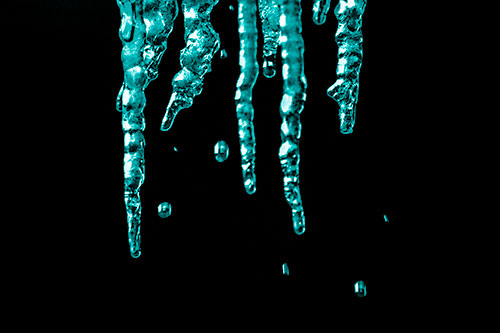 Jagged Melting Icicles Dripping Water (Cyan Shade Photo)