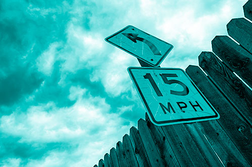 Left Turn Speed Limit Sign Beside Wooden Fence (Cyan Shade Photo)