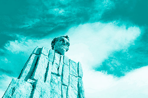 Presidents Statue Standing Tall Among Clouds (Cyan Shade Photo)