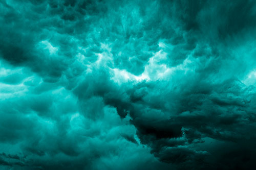 Raging Thunderstorm Clouds Brewing Among Sky (Cyan Shade)