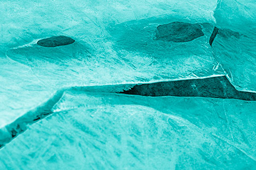 Rock Face Emerges Among Cracked Frozen Ice (Cyan Shade)