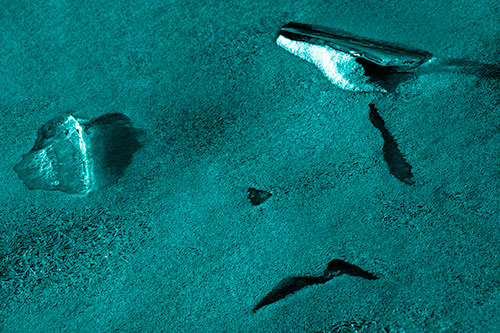 Sad Teardrop Ice Face Appears Atop Frozen River (Cyan Shade)