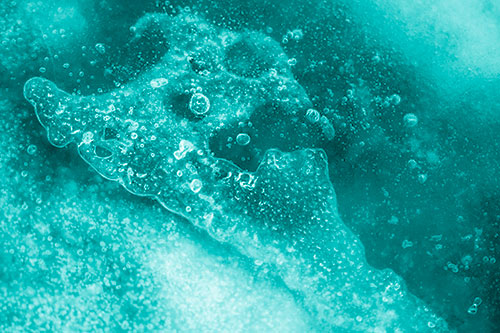 Screaming Submerged Bubble Face Creature Among Icy River (Cyan Shade Photo)