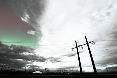 Cloud Clash Sunset Beyond Electrical Substation (Cyan Tint Photo)