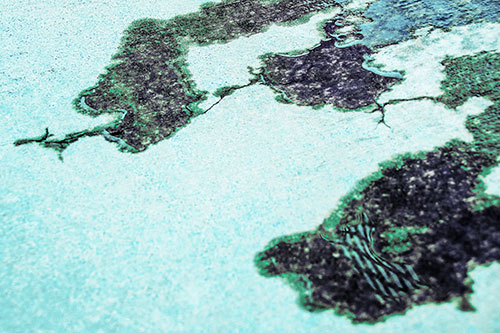 Creeping Water Puddle Across Concrete (Cyan Tint Photo)