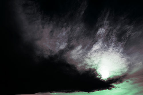 Dark Cloud Mass Holding Sun (Cyan Tint Photo)