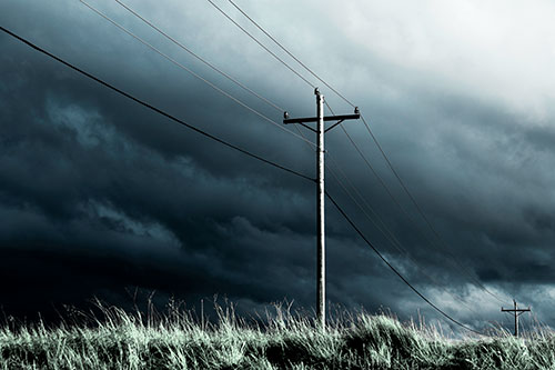 Dark Thunderstorm Clouds Over Powerline (Cyan Tint Photo)