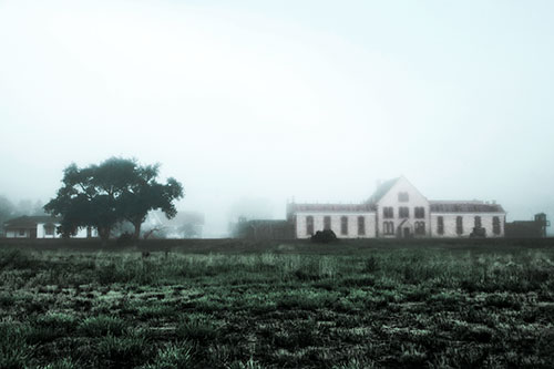 Departing Fog Reveals State Penitentiary (Cyan Tint Photo)