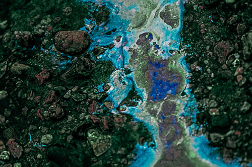 Distorted Oil Face Smearing Among Rocky Shore (Cyan Tint)