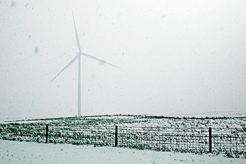 Fenced Wind Turbine Among Blowing Snow (Cyan Tint)