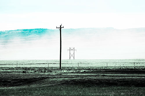 Heavy Fog Hiding Mountain Range Behind Powerlines (Cyan Tint Photo)