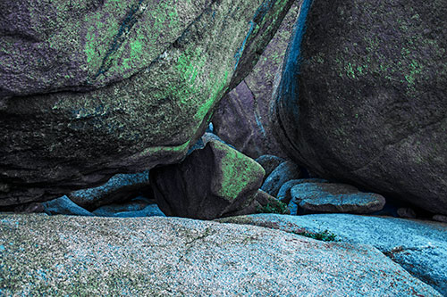 Large Crowded Boulders Leaning Against One Another (Cyan Tint Photo)