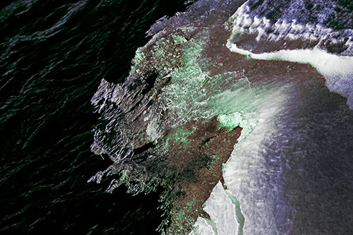 Melting Ice Face Creature Atop River Water (Cyan Tint)