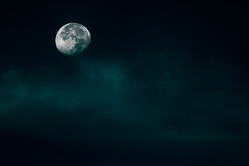 Moon Begins Descent Beyond Faint Mist Cloud (Cyan Tint Photo)