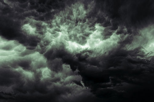 Raging Thunderstorm Clouds Brewing Among Sky (Cyan Tint)