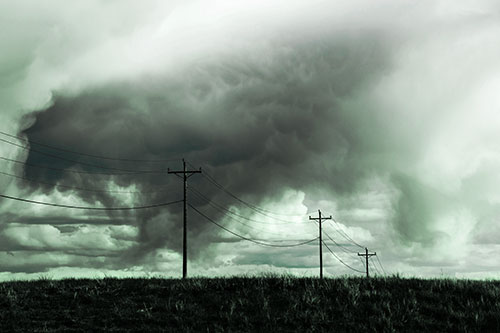 Rainstorm Clouds Twirl Beyond Powerlines (Cyan Tint)