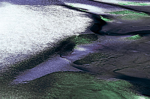 Sloping Ice Melting Atop River Water (Cyan Tint)
