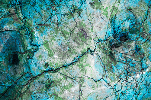 Smirking Chaos Cracked Rock Face (Cyan Tint)