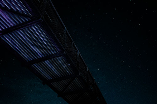 Stars Shining Above Walkway Bridge (Cyan Tint Photo)