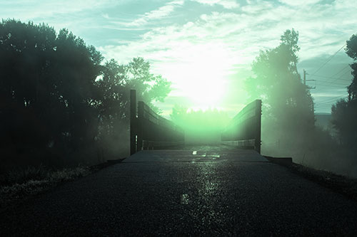Sun Rises Beyond Foggy Wooden Walkway Bridge (Cyan Tint Photo)