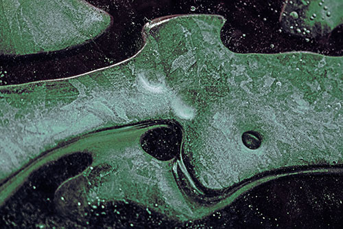 Swirling Frozen Smiling Bubble Eyed River Ice Face (Cyan Tint)