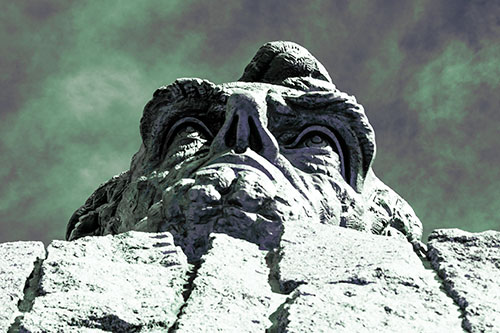 Vertical Upwards View Of Presidents Statue Head (Cyan Tint Photo)