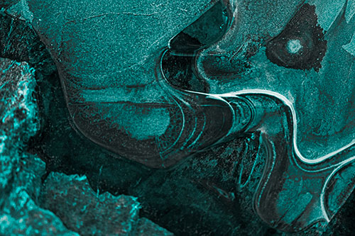 Angry Fuming Frozen River Ice Face (Cyan Tone Photo)