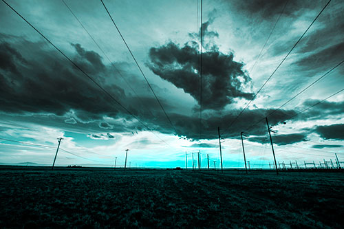 Creature Cloud Formation Above Powerlines (Cyan Tone Photo)