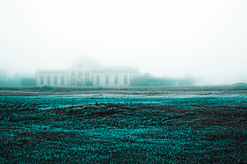 Dense Fog Consumes Distant Historic State Penitentiary (Cyan Tone Photo)