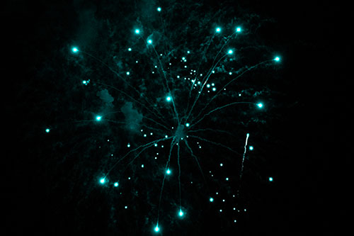 Firework Light Orbs Free Falling After Explosion (Cyan Tone Photo)