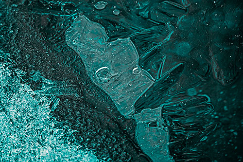 Frozen Bubble Eyed Ice Face Figure Along River Shoreline (Cyan Tone)