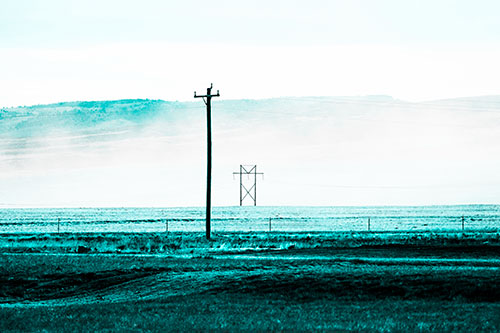Heavy Fog Hiding Mountain Range Behind Powerlines (Cyan Tone Photo)