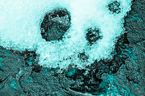 Ice Skull Snow Face Melting Atop Rock (Cyan Tone)
