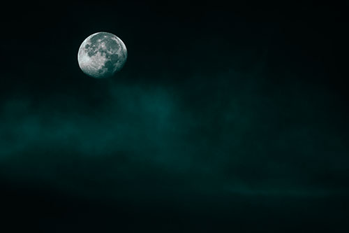 Moon Begins Descent Beyond Faint Mist Cloud (Cyan Tone Photo)