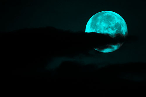 Pac Man Moon Swallows Clouds (Cyan Tone Photo)