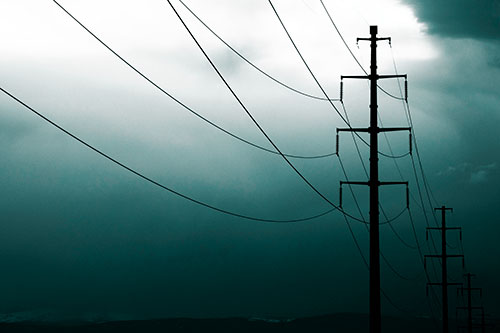 Powerlines Receding Into Thunderstorm (Cyan Tone Photo)
