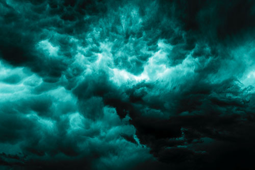 Raging Thunderstorm Clouds Brewing Among Sky (Cyan Tone)