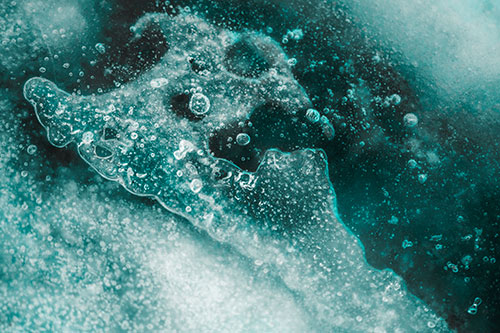 Screaming Submerged Bubble Face Creature Among Icy River (Cyan Tone)