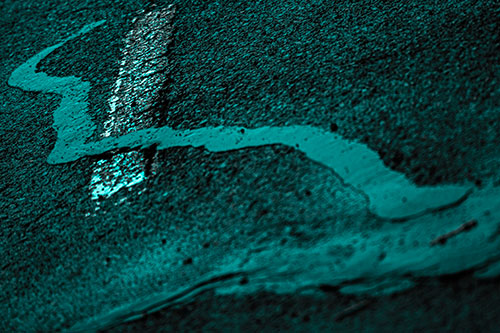 Slithering Tar Creeps Over Pavement Marking (Cyan Tone Photo)