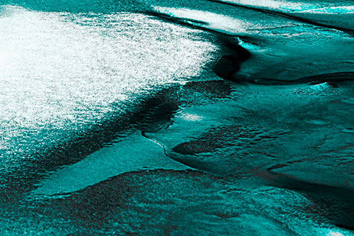 Sloping Ice Melting Atop River Water (Cyan Tone Photo)