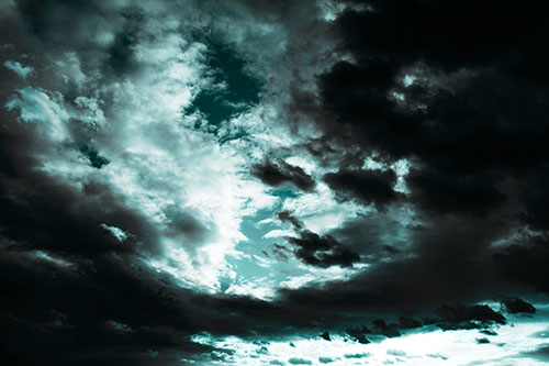 Thick Dark Cloud Refuses To Split In Half (Cyan Tone Photo)