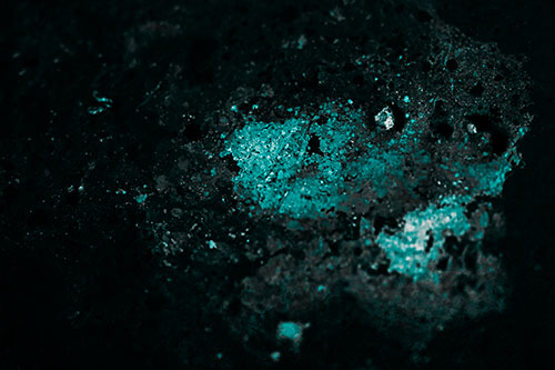 Wide Eyed Oil Demon Face Floating Atop Water (Cyan Tone)