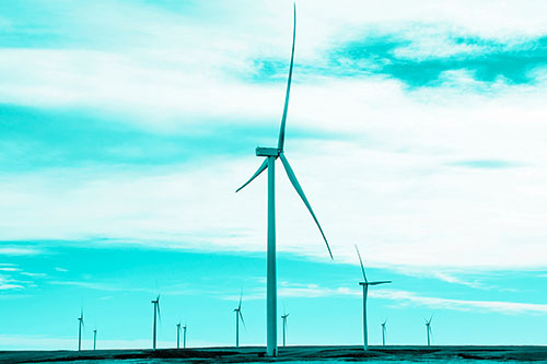 Wind Turbine Cluster Standing Tall Among Horizon (Cyan Tone)