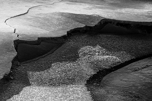 Cracked Ice Frozen Shoreline Melting (Gray Photo)
