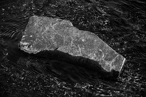 Massive Rock Atop Riverbed (Gray Photo)