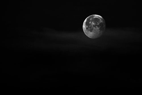 Moon Sets Behind Faint Clouds (Gray Photo)
