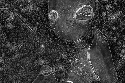 Mouthless Alien Ice Figure Forms Among Frozen River Water (Gray)