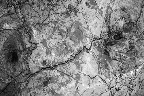 Smirking Chaos Cracked Rock Face (Gray)